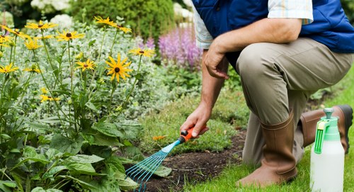 Twickenham gardener planting flowers